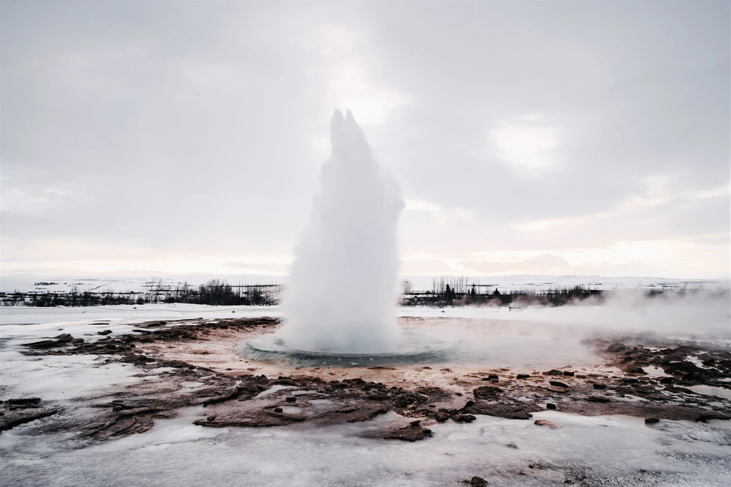 Watch a geyser throw boiling water fifteen meters into the air