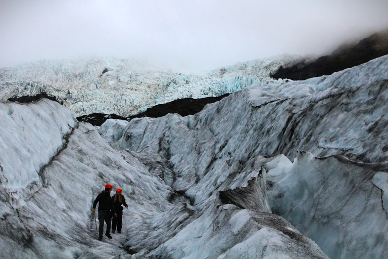 Walk up a glacier in crampons, above where its ice ended thirty years ago