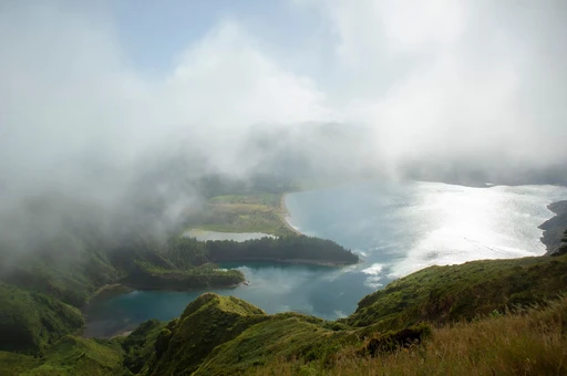 Breathtaking view of Lagoa do Fogo with misty clouds in São Miguel, Azores, Portugal.