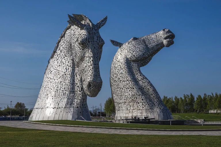 Stand under two steel horse heads thirty meters tall