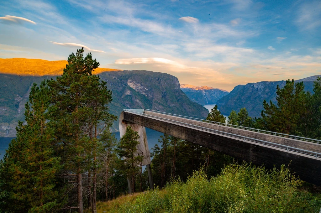Lean on the glass at the end of a platform pushed thirty meters out of a mountainside