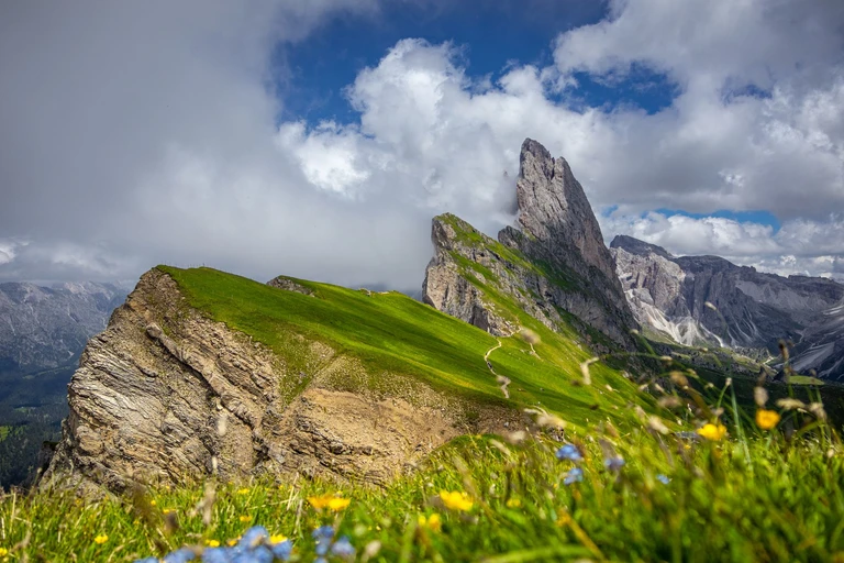 Walk up a meadow that stops at a sheer drop