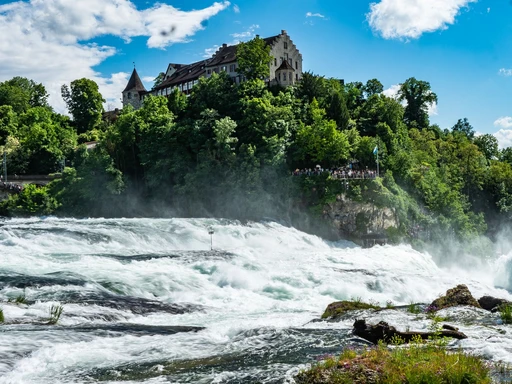 Experience the breathtaking Rhine Falls and majestic castle in Schaffhausen, Switzerland.