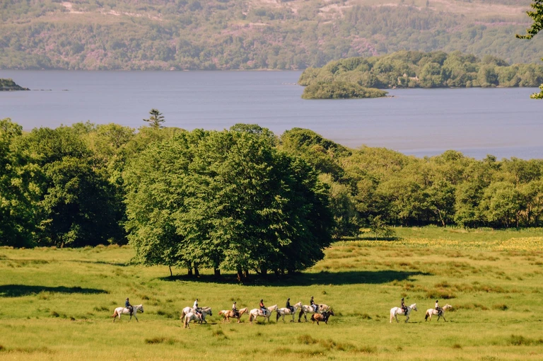 Ride a horse along the lakes of Killarney