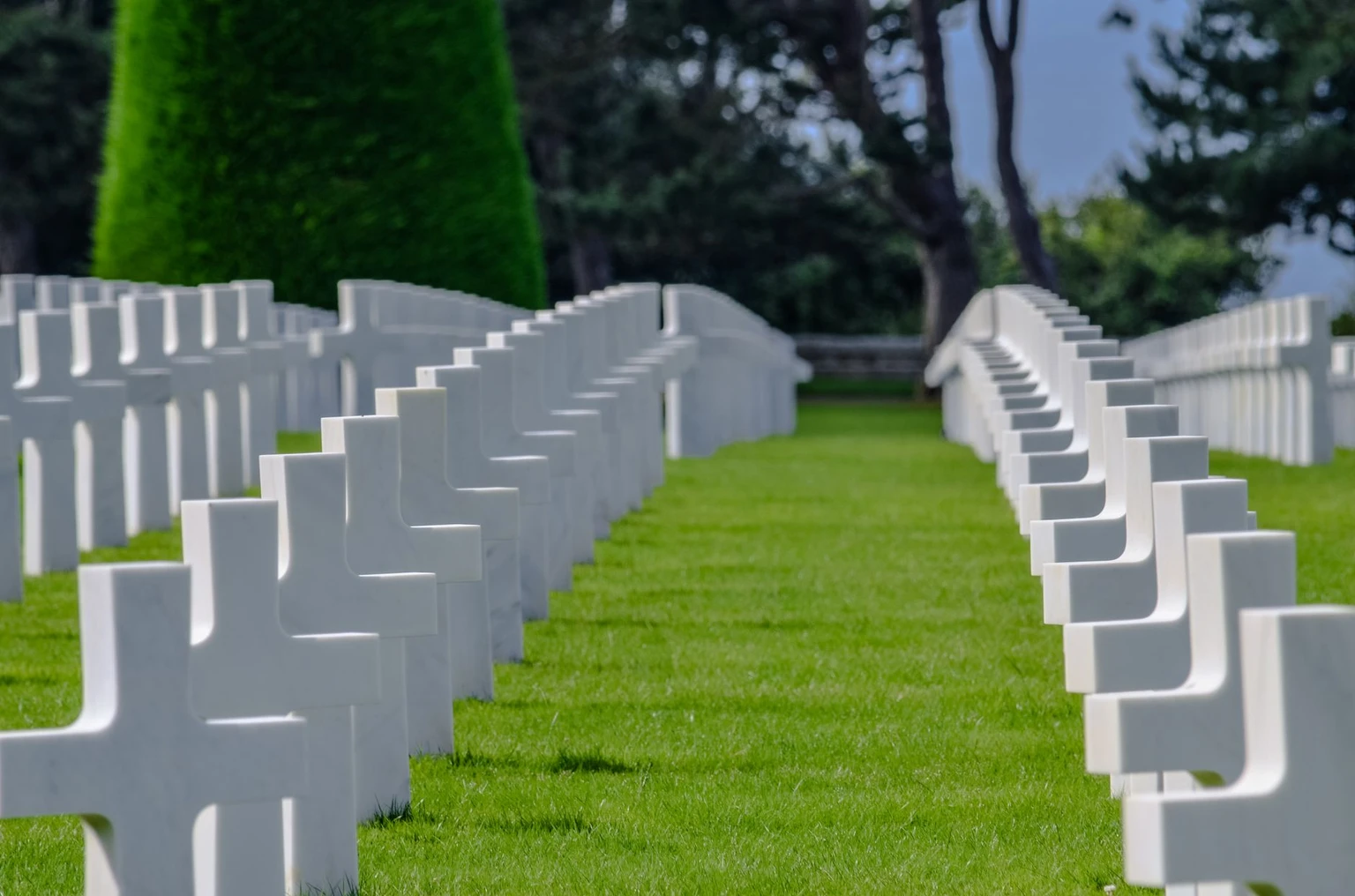 Long rows of white grave markers at the Normandy American Cemetery in Colleville-sur-Mer.