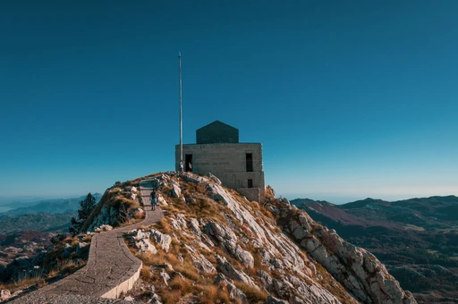 Climb a tunnel inside a mountain to a tomb on its summit