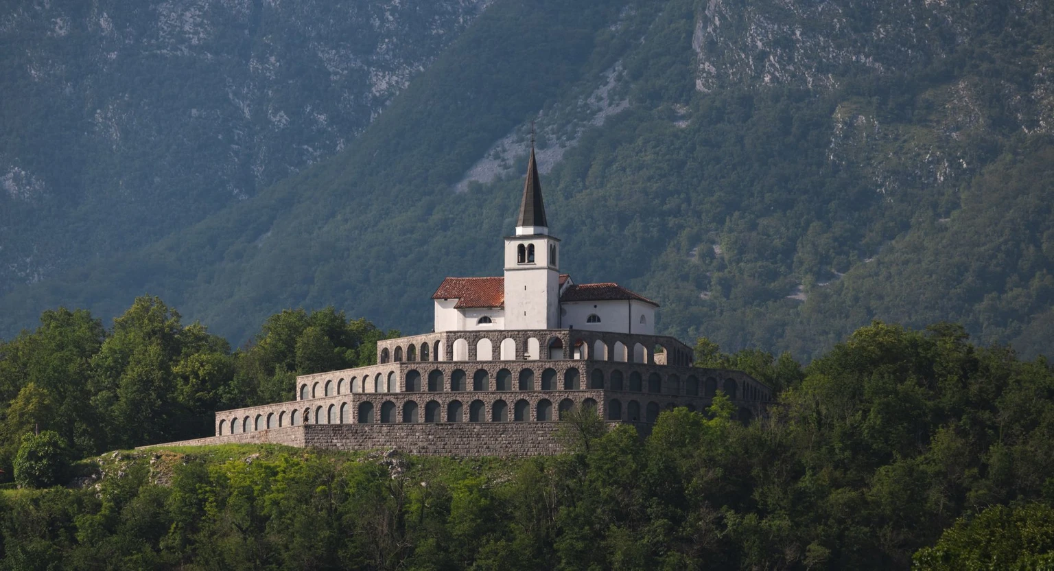 The Italian Charnel House at Kobarid, a WWI memorial amidst Slovenian mountains.