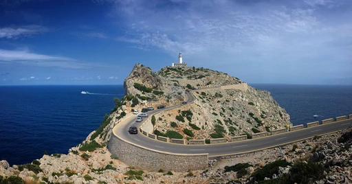 The road winding out along the Formentor peninsula toward the lighthouse at the cape.
