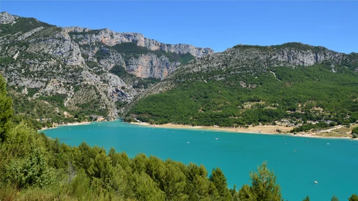 Aerial view of the turquoise lake and green hills near Aiguines, at the head of the Verdon gorge.